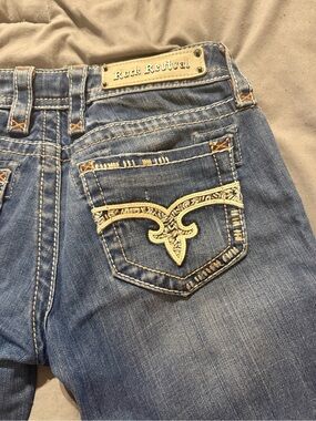 Rock Revival Blue Denim Jeans with Cream Embroidered Back Pocket